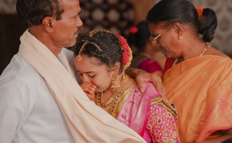 Indian Wedding Photo with a Crying Bride with Parents