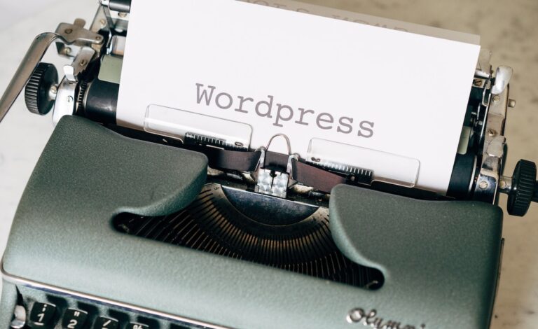 black typewriter on green table